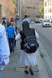 October 29, 2013<br>Nun outside the Vatican.  What's in the backpack?